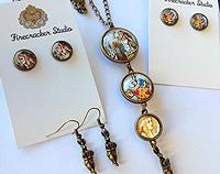 Alice in Wonderland double sided triple drop pendant