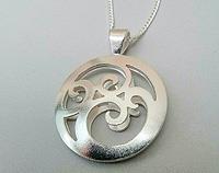 Rhythm Koru disc double sided pendant