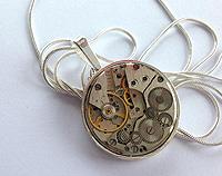 Vintage time piece - silver pendant in silver-plated setting